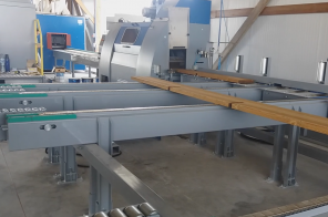 AUTOMATIC LINE FOR SANDING, STRUCTURING AND FLOW-COATING OF OUTBUILDINGS COMPONENTS